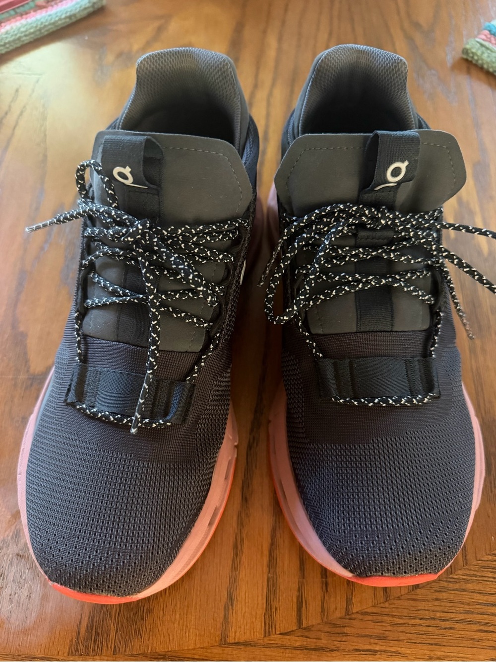 On Running Women’s Cloudnova Black with Pink Midsole Running Shoes